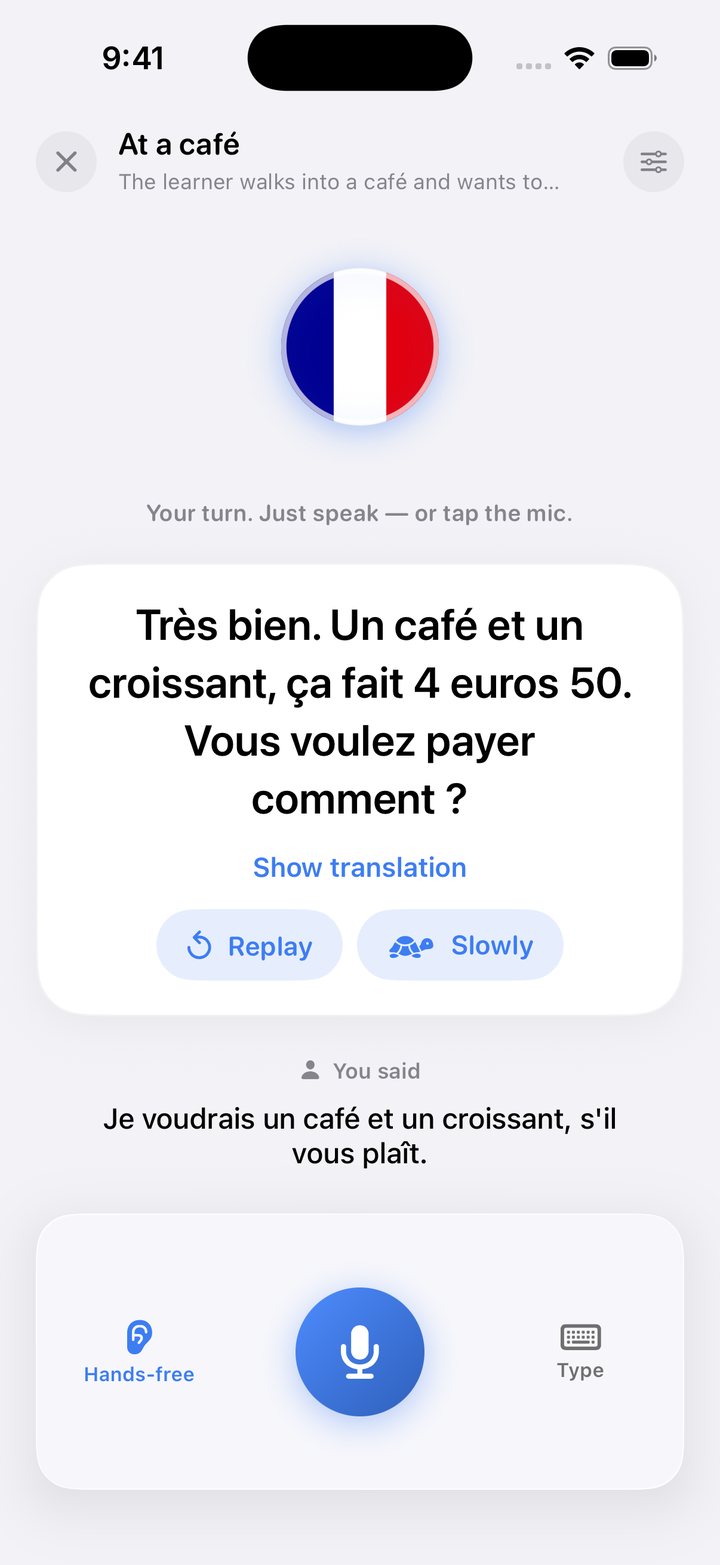 Talvo's conversation screen: the tutor replies in French at a café and waits for you to answer out loud
